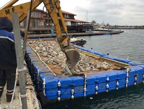 piattaforma galleggiante per dragaggio e trasporto detriti
